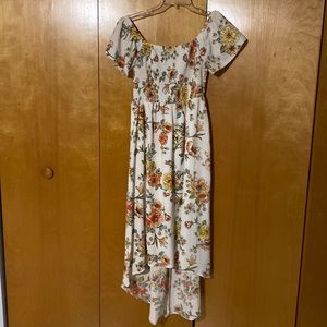 Beautiful off the shoulder and dress! Back  of dress is longer than the front!